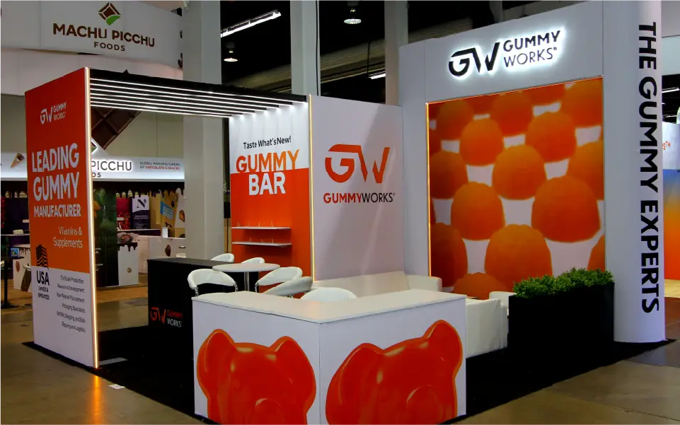 dimensional 3D logo signage with halo lighting on custom trade show exhibit booth